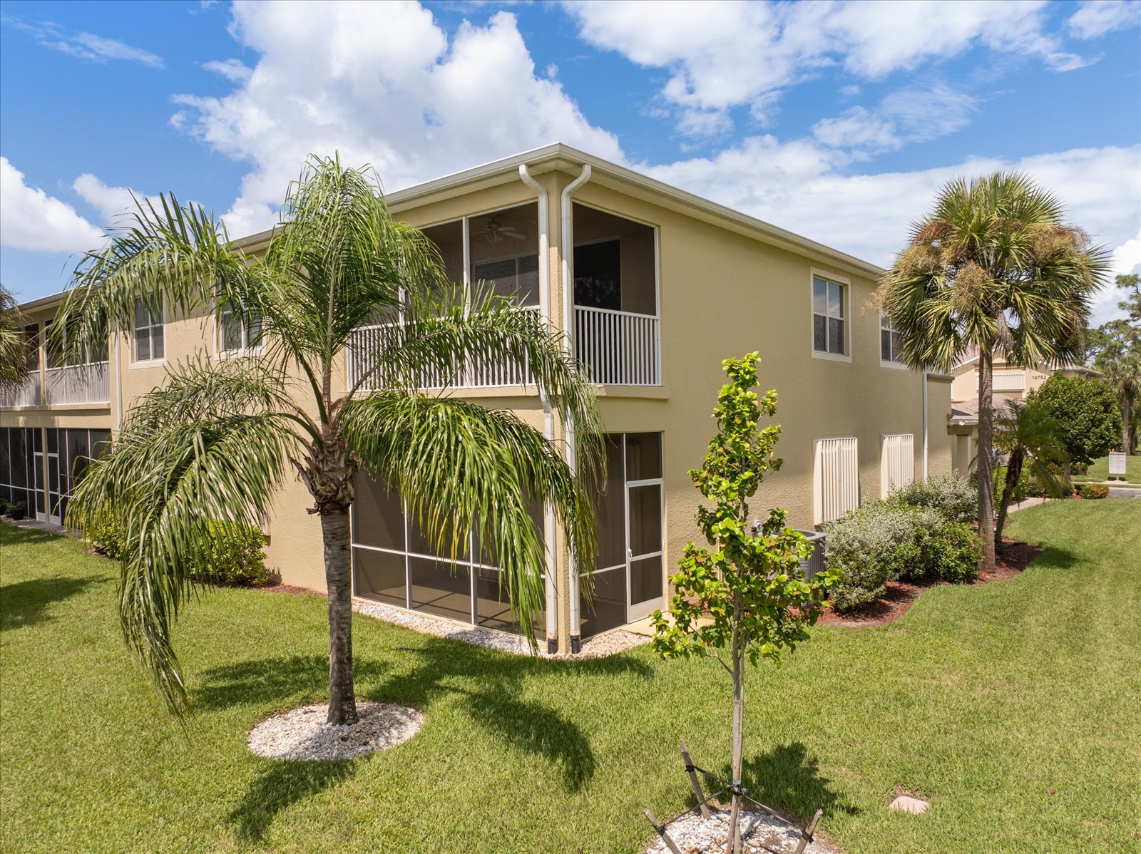 Aerial view of Calusa Palms with homes, lakes and palm trees
